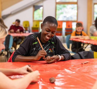 Woman taking part in a clay workshop